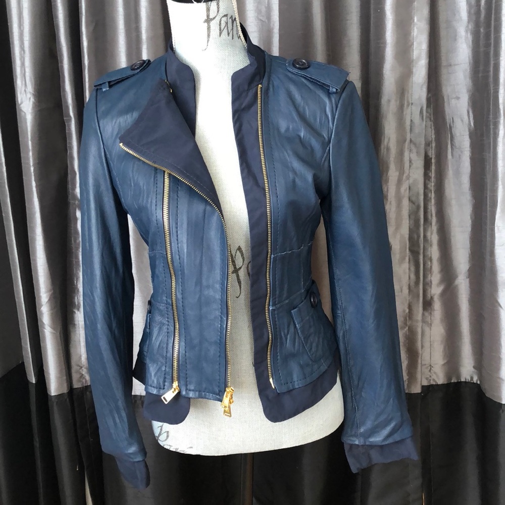 Navy blue leather jacket by BCBG. Never worn!